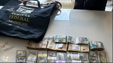 Apreensão de dinheiro durante a fase 25 da Operação Lesa Pátria. Foto: Polícia Federal